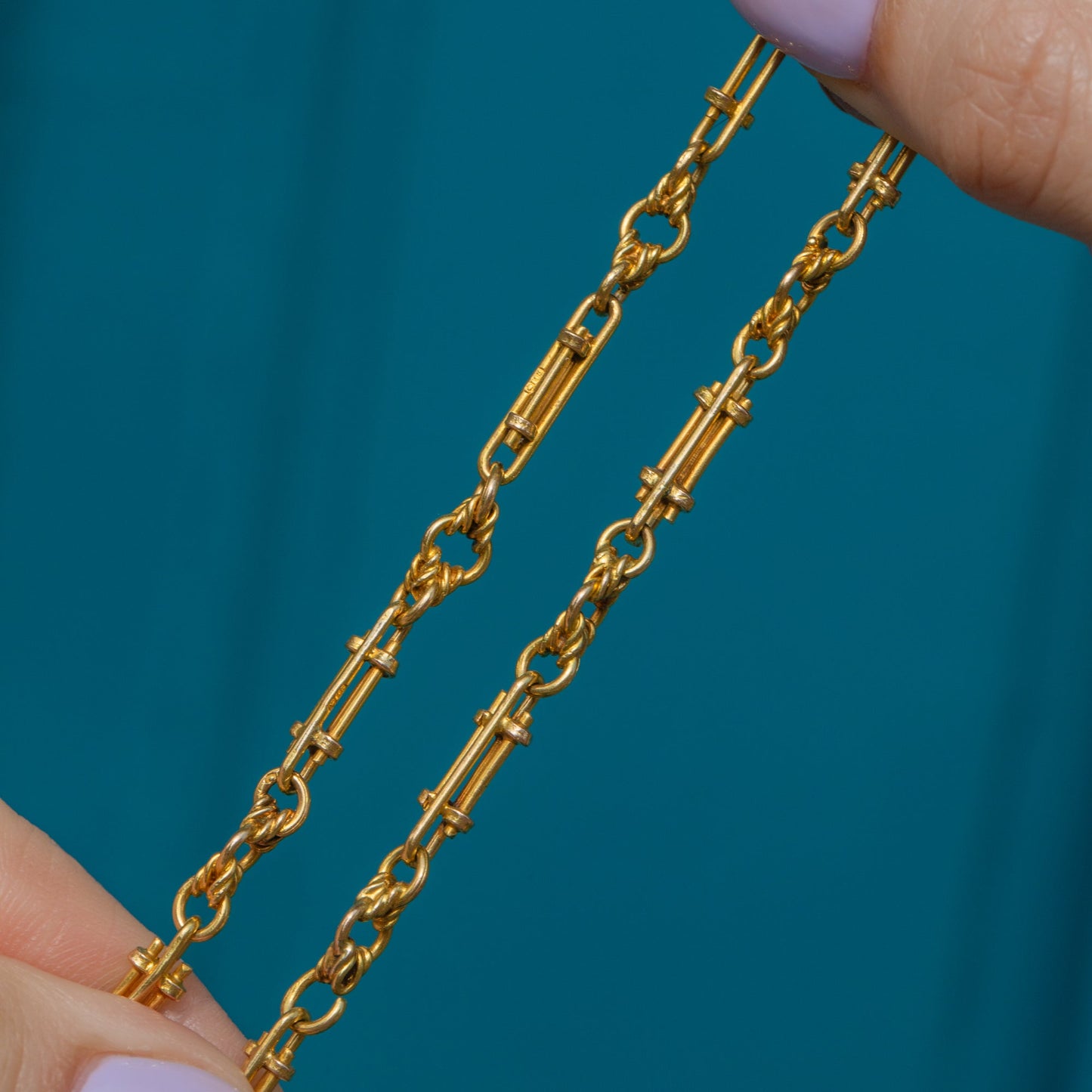 17 Antique 18ct Gold Lover's Knot Chain with Dog-Clip, 22.3g